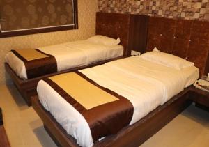 Postel nebo postele na pokoji v ubytování Hotel Angina