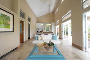 a living room with a couch and a table at 4 Casitas in Cabo Rojo