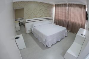 Postel nebo postele na pokoji v ubytování HOTEL HPR