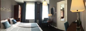 Voodi või voodid majutusasutuse Hotel Johannes Vermeer Delft toas