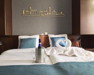 Voodi või voodid majutusasutuse Hotel Johannes Vermeer Delft toas