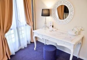 חדר רחצה ב-Hotel Capitolina City Chic