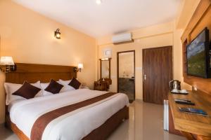 Letto o letti in una camera di Hotel Lake Shore