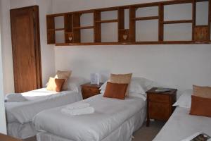 Postel nebo postele na pokoji v ubytování Hotel Sylvana