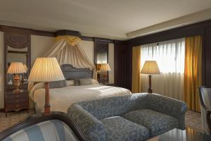 Postel nebo postele na pokoji v ubytování Hotel Cordoba Center