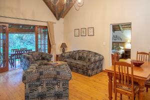 Posezení v ubytování Coral Tree Cottages