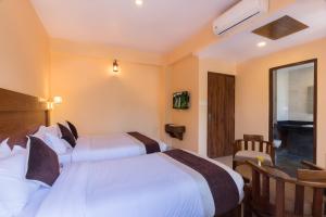 Letto o letti in una camera di Hotel Lake Shore