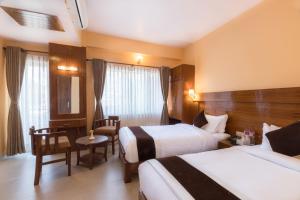 Letto o letti in una camera di Hotel Lake Shore