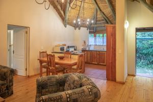 Kuchyň nebo kuchyňský kout v ubytování Coral Tree Cottages