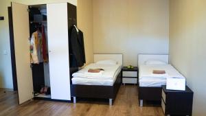 Postel nebo postele na pokoji v ubytování Bella Riga Hotel with Self-Check in
