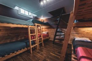 Postel nebo postele na pokoji v ubytování Corner Hostel Puerto Natales