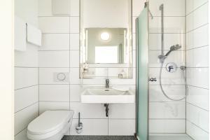 Koupelna v ubytování Hotel am Stadtrand + 22 fotografií