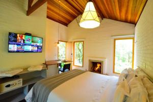 TV a/nebo společenská místnost v ubytování Resort Magnifico