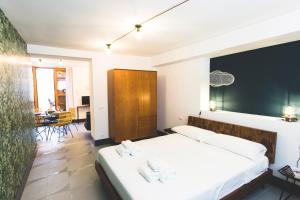 Tempat tidur dalam kamar di Case Madira