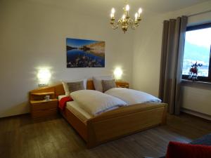 Łóżko lub łóżka w pokoju w obiekcie Sportpension Christina by PiaundDirk