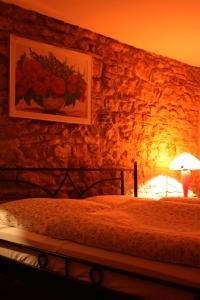 Postel nebo postele na pokoji v ubytování Hotel Weingewolbe
