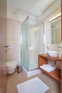 Koupelna v ubytování Hotel Delalut