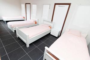 Postel nebo postele na pokoji v ubytování jutta