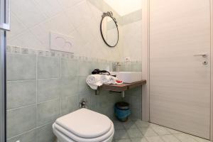 Koupelna v ubytování A Roman Tale B&B