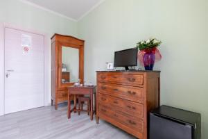 TV a/nebo společenská místnost v ubytování A Roman Tale B&B + 20 fotografií