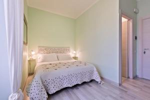 Postel nebo postele na pokoji v ubytování A Roman Tale B&B
