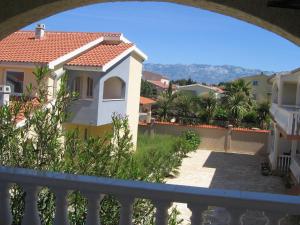 a view from the balcony of a house at Apartments Palma in Vir