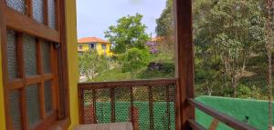 Балкон или терраса в Chales Quinteto de Cores +29 фотографий