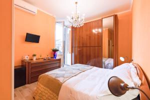 Postel nebo postele na pokoji v ubytování A Roman Tale B&B