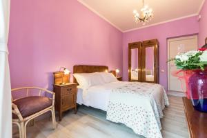 Postel nebo postele na pokoji v ubytování A Roman Tale B&B