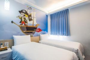 Postel nebo postele na pokoji v ubytování Morwing Hotel - Ocean