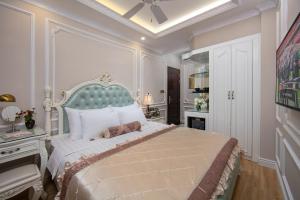 Voodi või voodid majutusasutuse Royal Holiday Hanoi Hotel toas