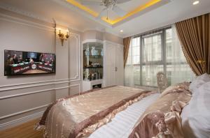 Voodi või voodid majutusasutuse Royal Holiday Hanoi Hotel toas