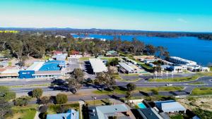 an aerial view of a town with a lake at Centretown Motel in Nagambie