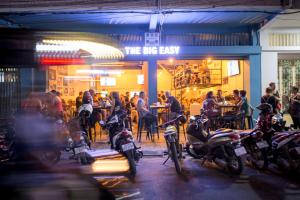 a group of motorcycles parked in front of a restaurant at The Big Easy Phnom Penh in Phnom Penh