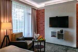 Μια τηλεόραση ή/και κέντρο ψυχαγωγίας στο Spa Hotel Calista