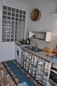 Cucina o angolo cottura di Pà Blanc B&B