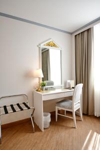 Rúm í herbergi á Wangcome Hotel