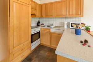 Een keuken of kitchenette bij Försterli West