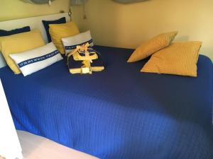 Postel nebo postele na pokoji v ubytování CinqueTerreBlu IrisBlu