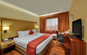 A television and/or entertainment centre at The Fern Residency, Jaipur