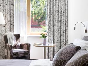 Postel nebo postele na pokoji v ubytování Boutiquehotel Stadthalle