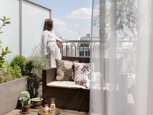 Balkón nebo terasa v ubytování Boutiquehotel Stadthalle