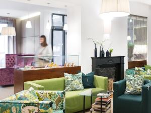 Posezení v ubytování Boutiquehotel Stadthalle