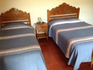 Katil atau katil-katil dalam bilik di Posada de la Salud