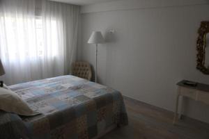 Posteľ alebo postele v izbe v ubytovaní Apartamento Montes de Oca