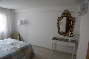 Posteľ alebo postele v izbe v ubytovaní Apartamento Montes de Oca
