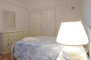Llit o llits en una habitació de Villa Giovanna