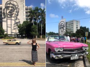 a woman standing next to a pink car in a parking lot at Casa Estrella Azul in Havana