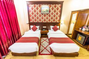 Cama o camas de una habitación en Hotel Pokhara Goodwill