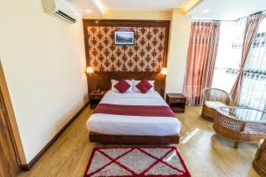 Cama o camas de una habitación en Hotel Pokhara Goodwill